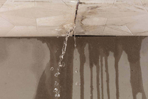 Professional Flood Damage Cleanup technician working in Wattsburg, PA